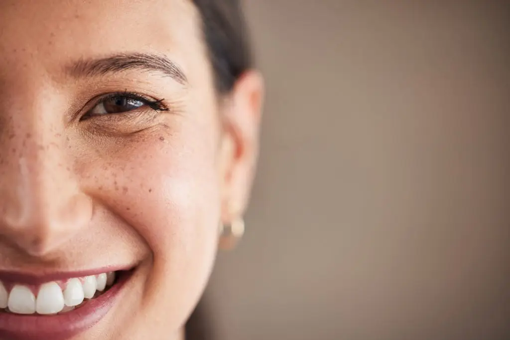 Face of beautiful mixed race woman smiling